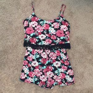 Pink floral romper and purple floral romper